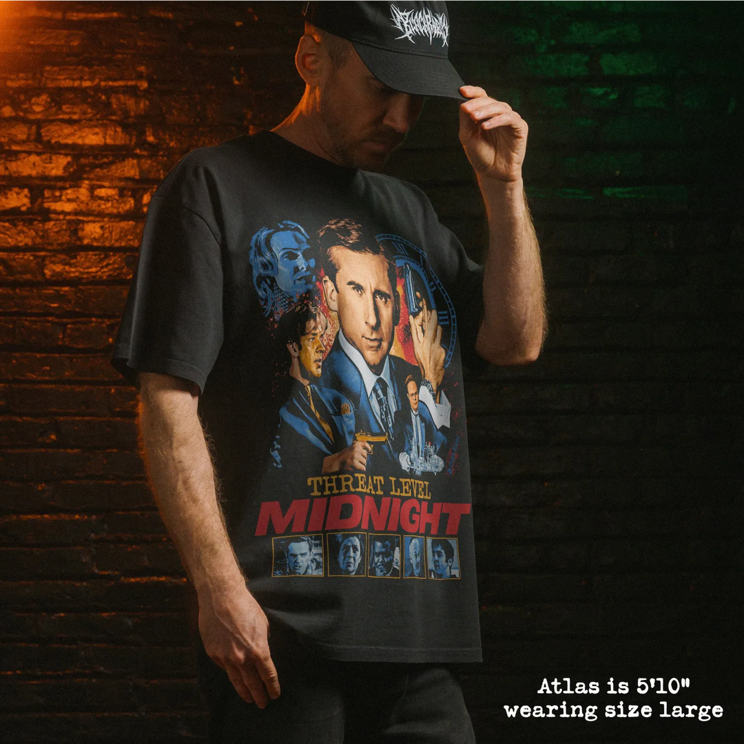 Model wearing heavy tee with threat level graphic 