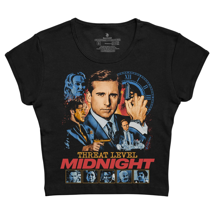 Black short-sleeved t-shirt featuring a vibrant graphic of the movie ’threat level midnight’ with characters in suits and guns, set against a clock backdrop.