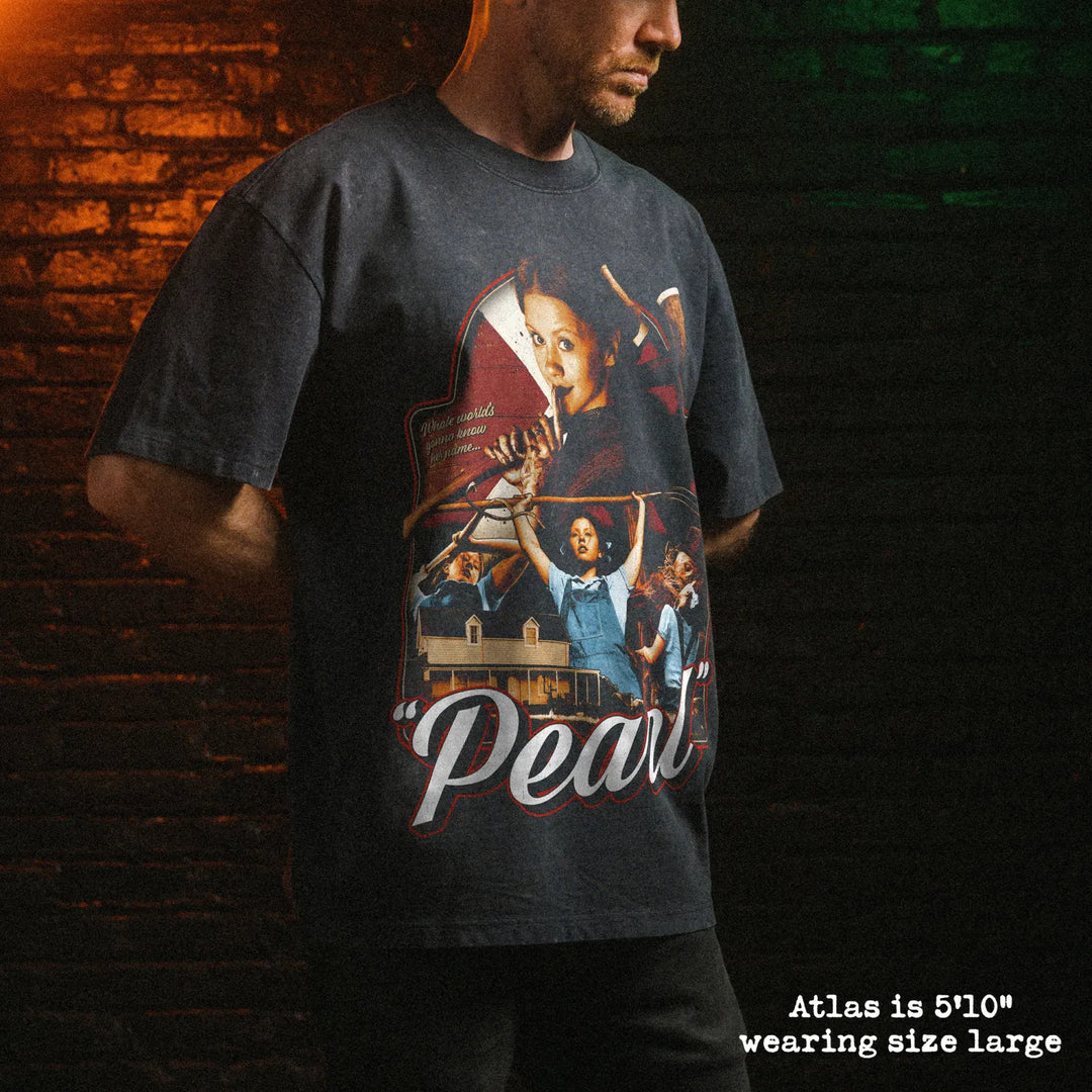 Male model wearing stone wash heavy tee with pearl graphic 