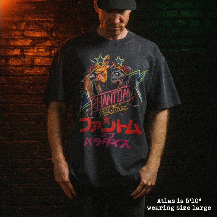 Male model wearing heavy stone washed tee with phantom of the paradise japan graphic. 