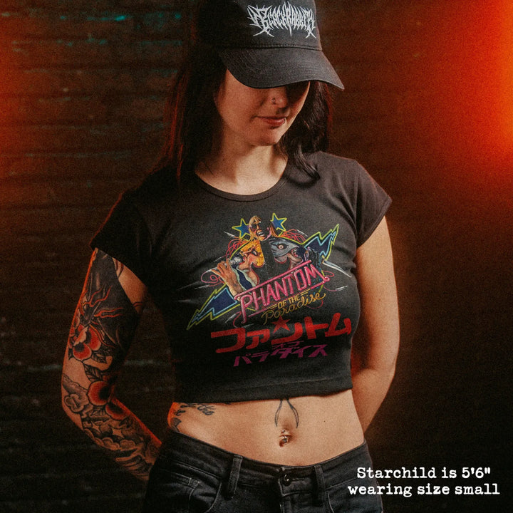 Female model wearing cropped baby tee with phantom of the paradise japan graphic
