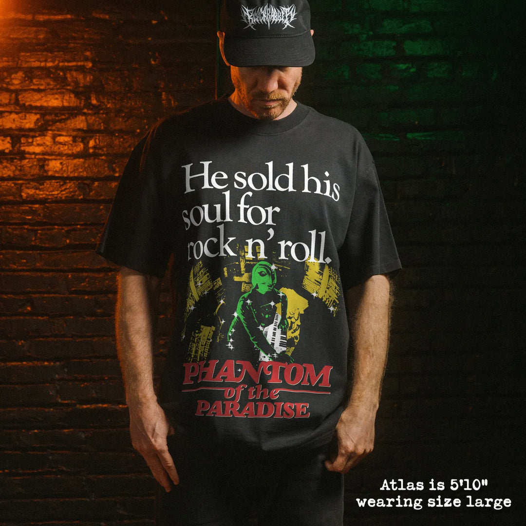 Model wearing heavy tee with phantom to the paradise graphic 