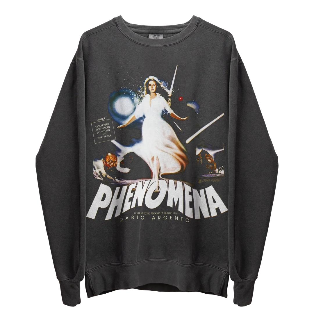 A dark grey long-sleeved crewneck sweatshirt with a colorful graphic print of a woman in a white dress, the movie title ’PHENOMENA,’ and ’DARIO ARGENTO’ at the bottom.