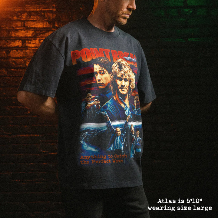 Male model wearing stone wash heavy tee with point break graphic 