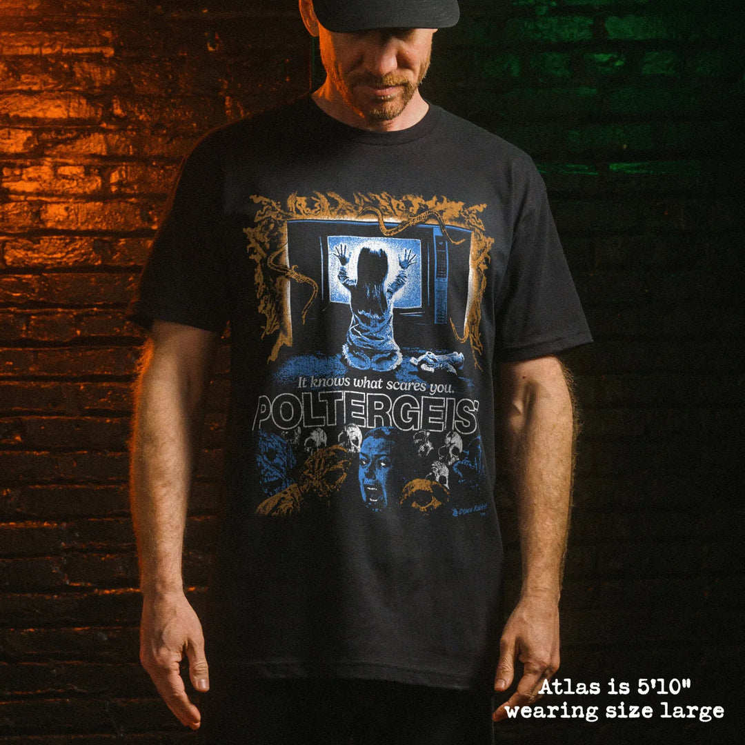 Male model wear soft premium tee with poltergeist graphic
