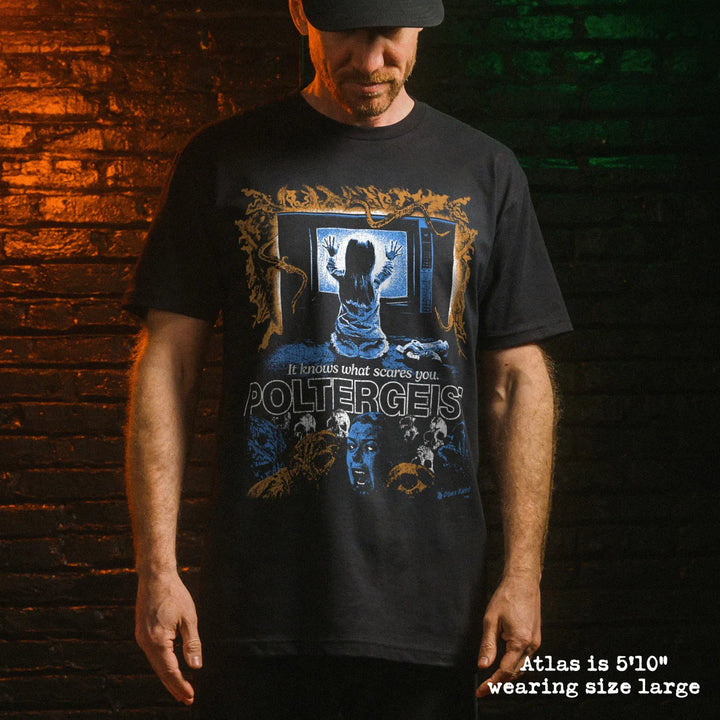 Male model wear soft premium tee with poltergeist graphic
