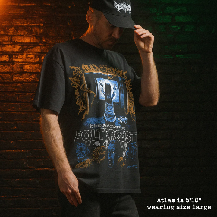 Model wearing heavy tee with poltergeist graphic 
