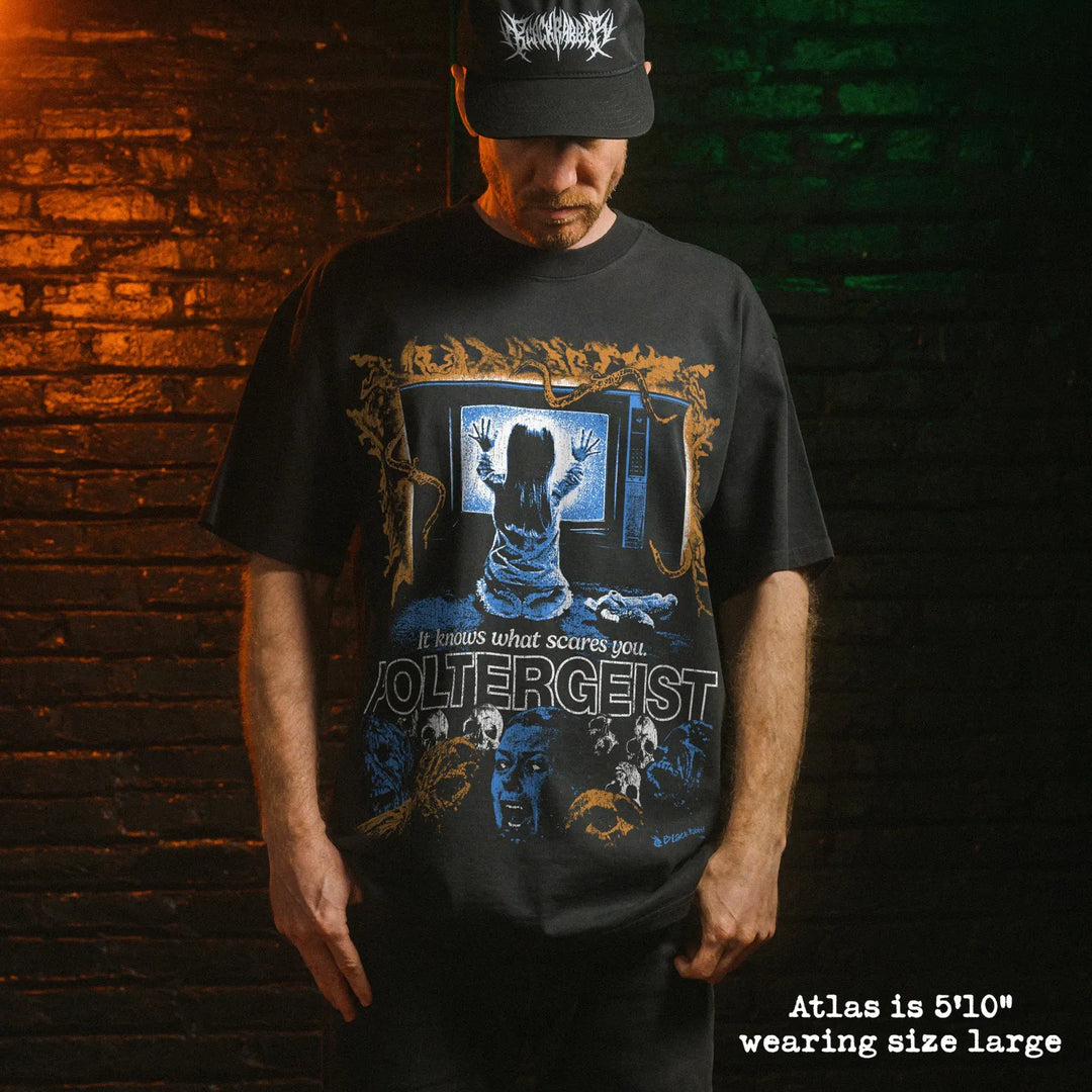 Model wearing heavy tee with poltergeist graphic 