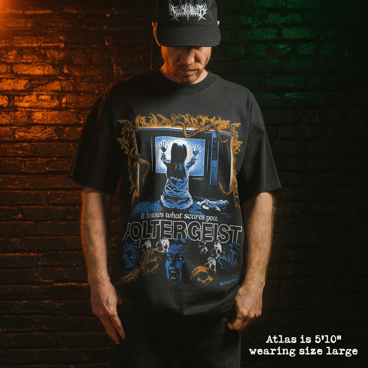 Model wearing heavy tee with poltergeist graphic 