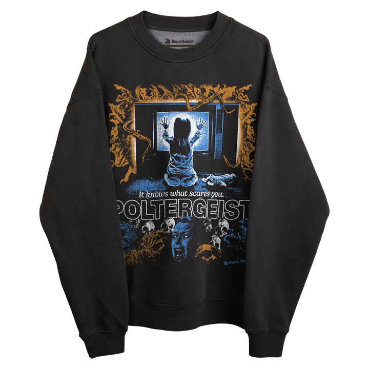 Poltergeist sweatshirt with ghostly design and text, black material.