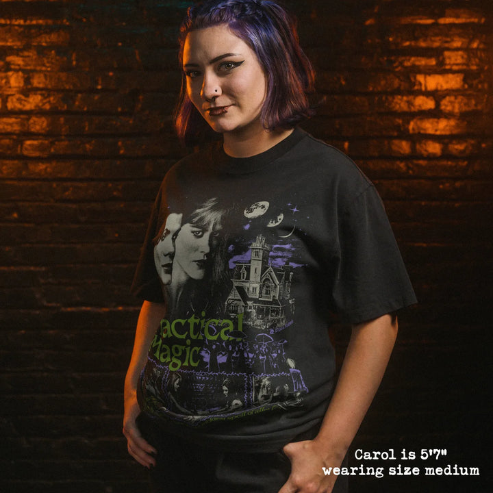 Model wearing heavy tee with practical magic graphic 