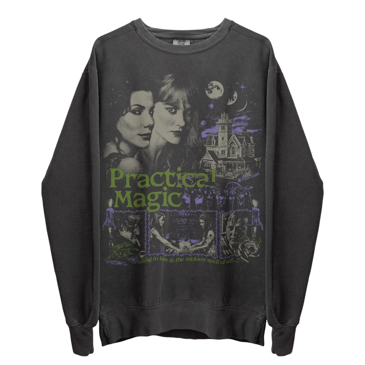 Dark gray long-sleeve sweatshirt with a graphic print featuring two women, a spooky house, and the words ’Practical Magic.’