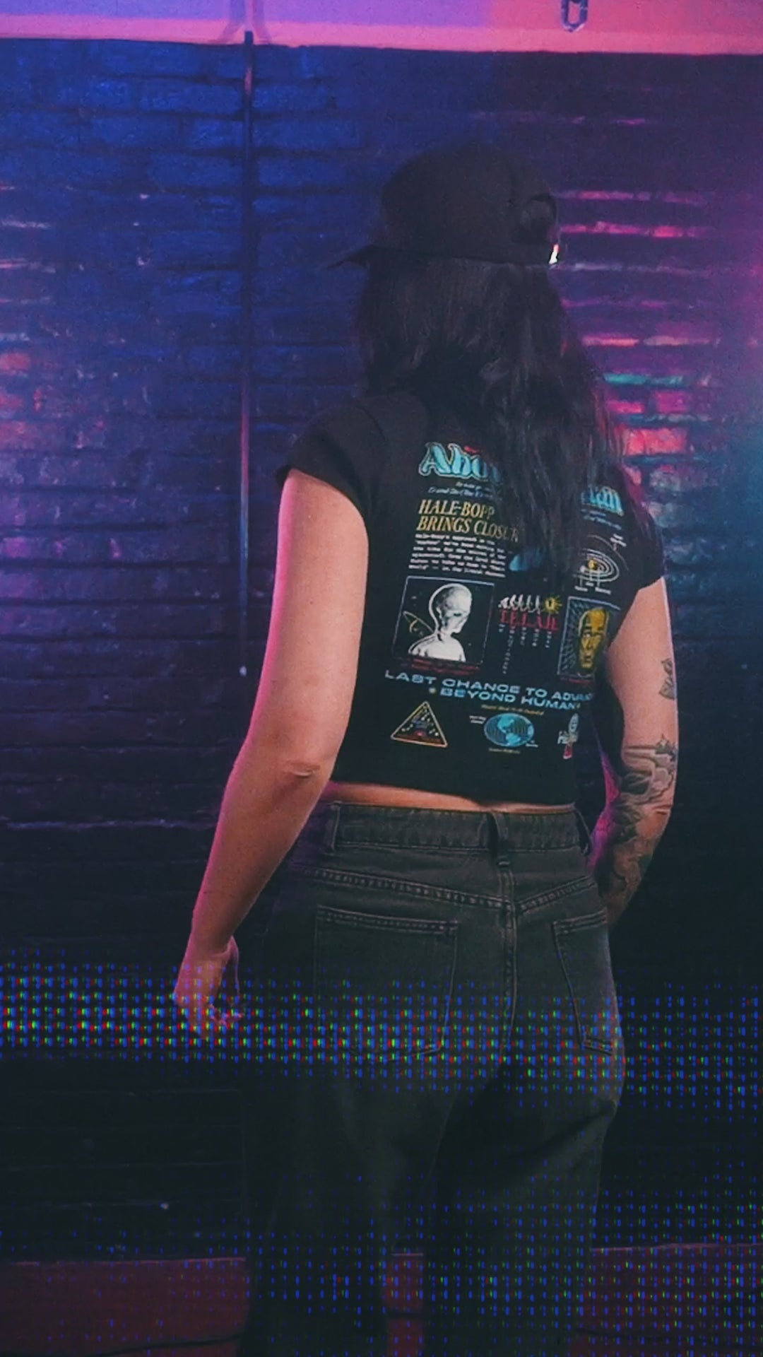 Female model wearing cropped baby tee with heaven&