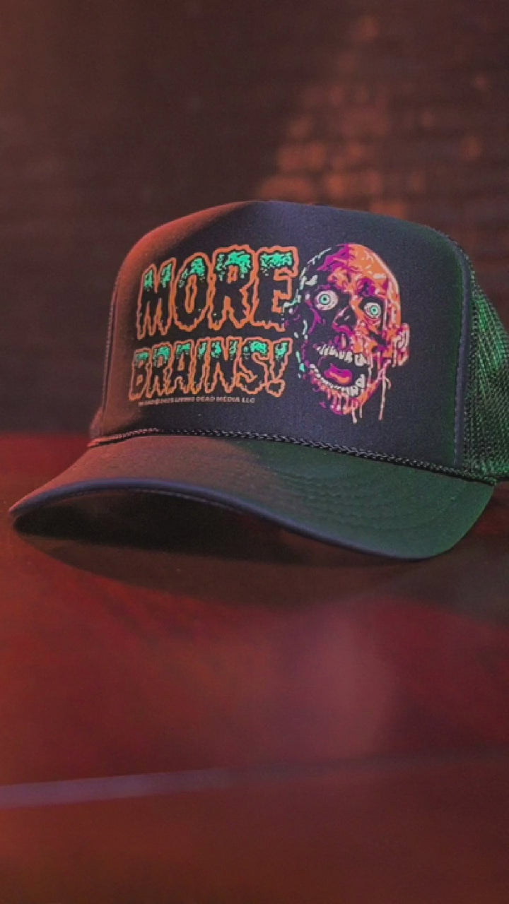 Black trucker hat with zombie graphic. 