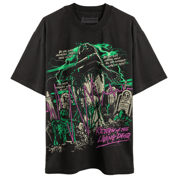 A black short-sleeve graphic t-shirt featuring a horror-themed design with a zombie, tombstones, green lightning, and purple text reading 'Return of the Living Dead'