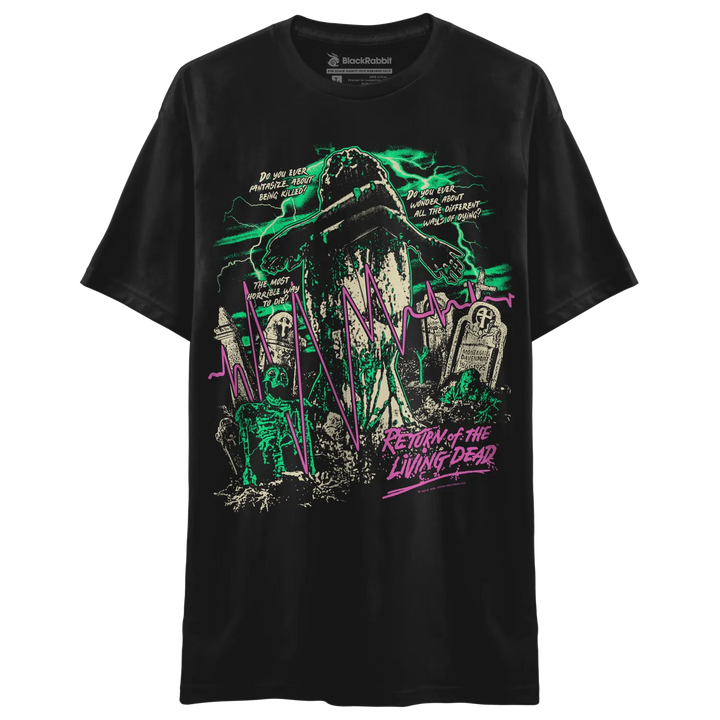 A black short-sleeve graphic t-shirt featuring a horror-themed graveyard illustration with green and pink neon accents and the text 'Return of the Living Dead'.