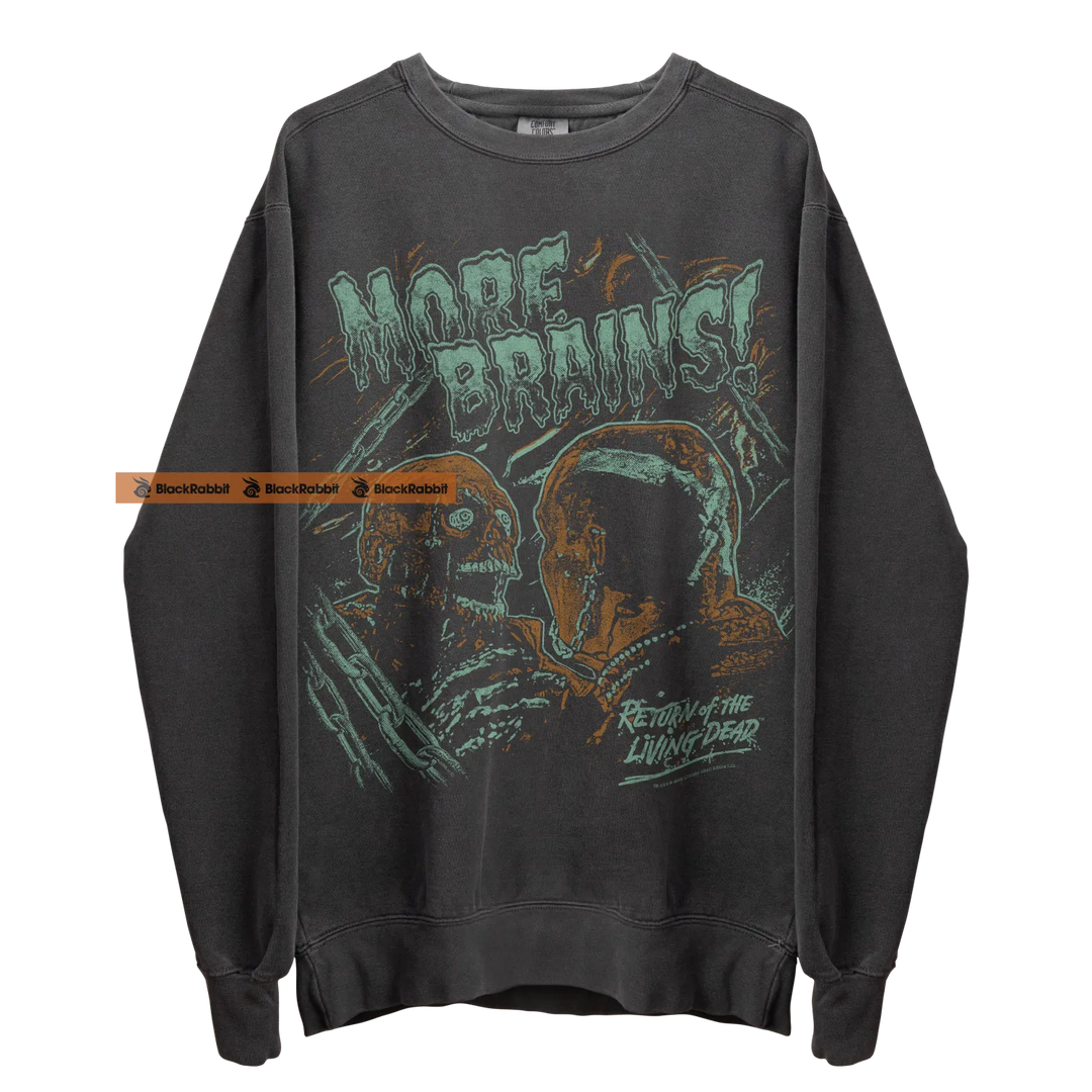 Gray sweatshirt with zombie graphic.