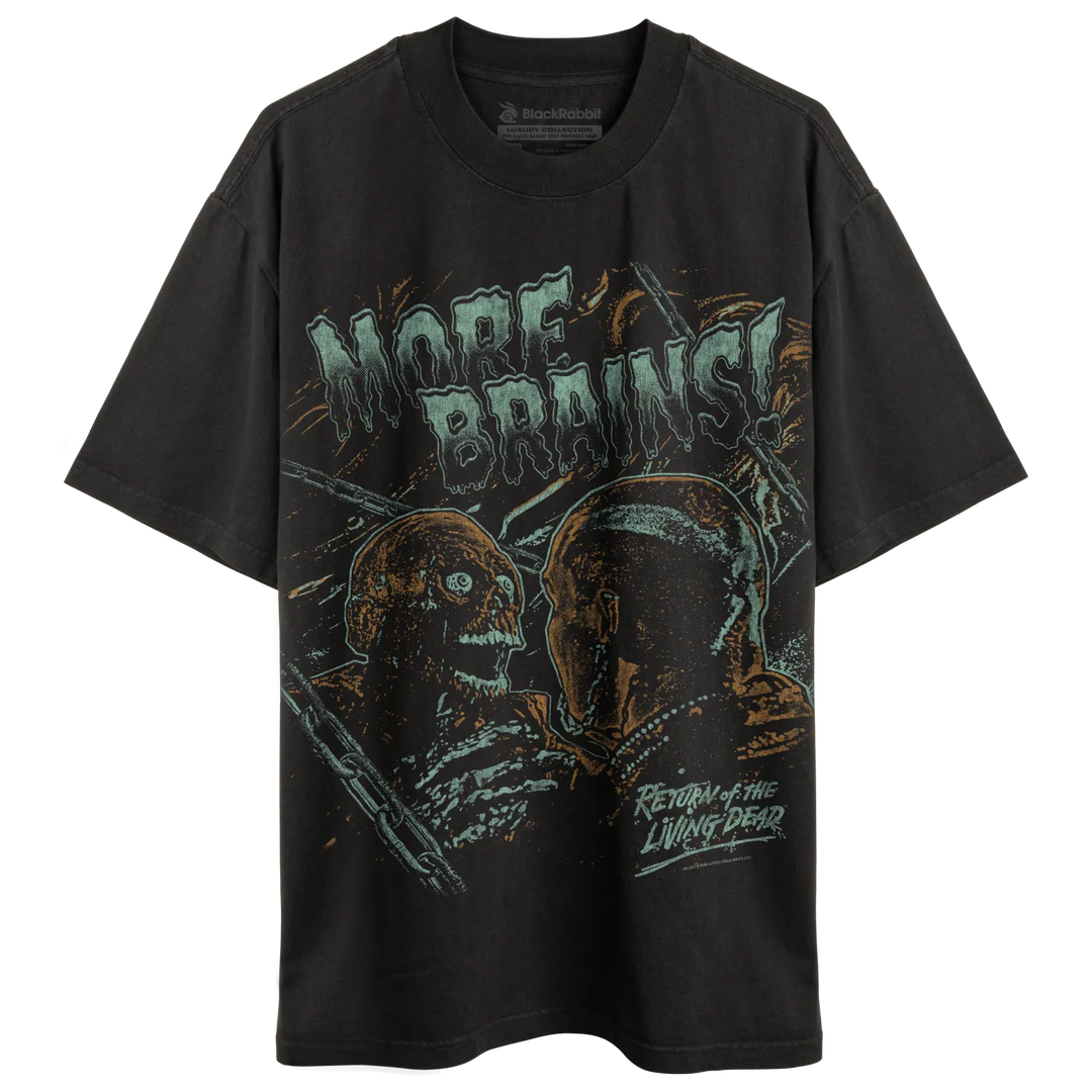 Black graphic tee with zombie design and ’more brains’ text, material unknown.