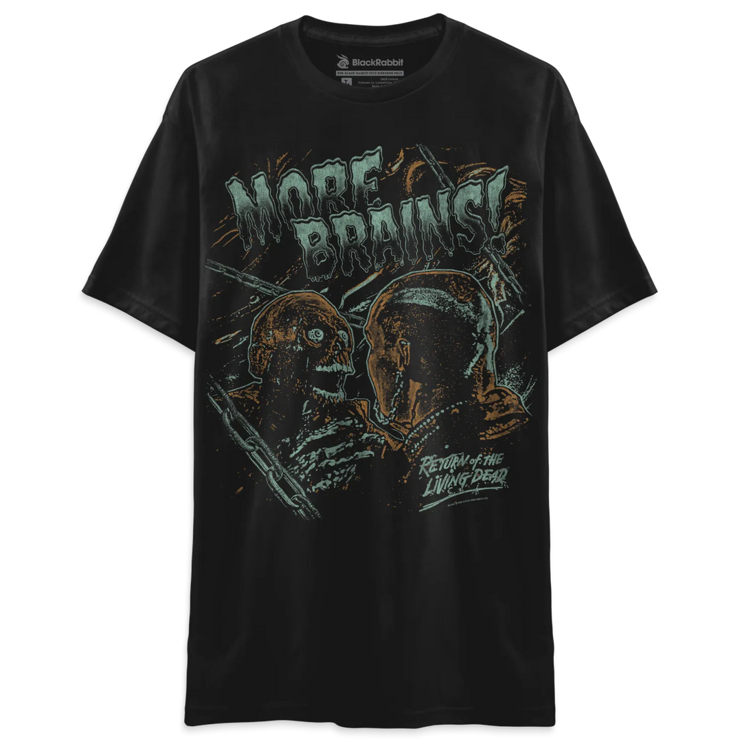 Black t-shirt with graphic design of zombie heads and the text ’more brains’ in white, green, yellow, red, blue, and orange.