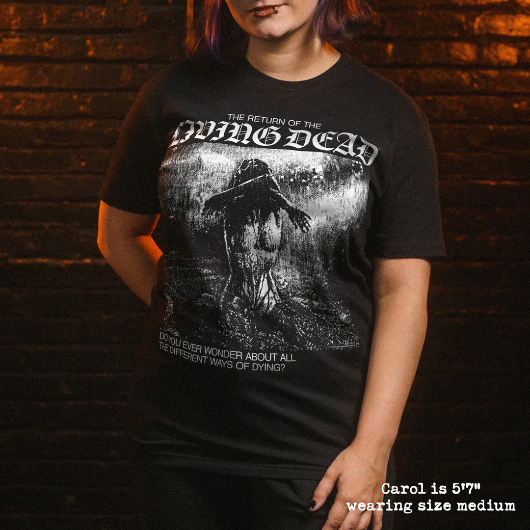 A woman wearing a black graphic t-shirt for 'The Return of the Living Dead'.