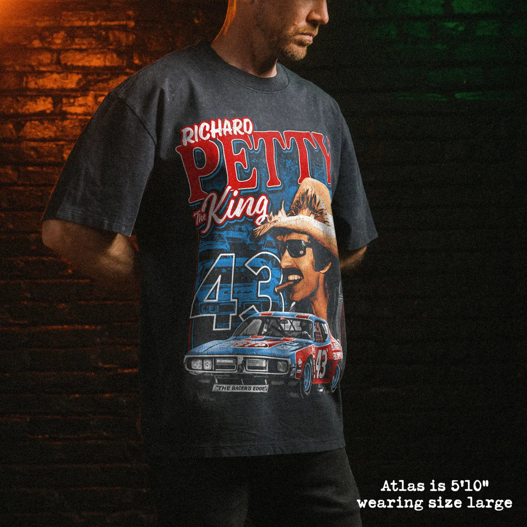Male model wearing stone wash heavy tee with richard petty graphic 