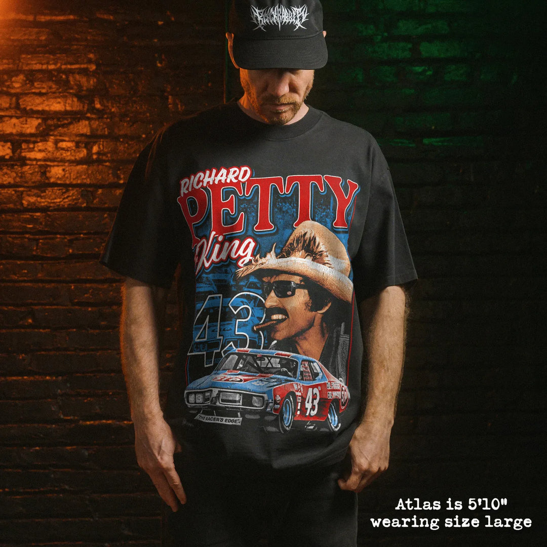 Model wearing heavy tee with petty graphic 
