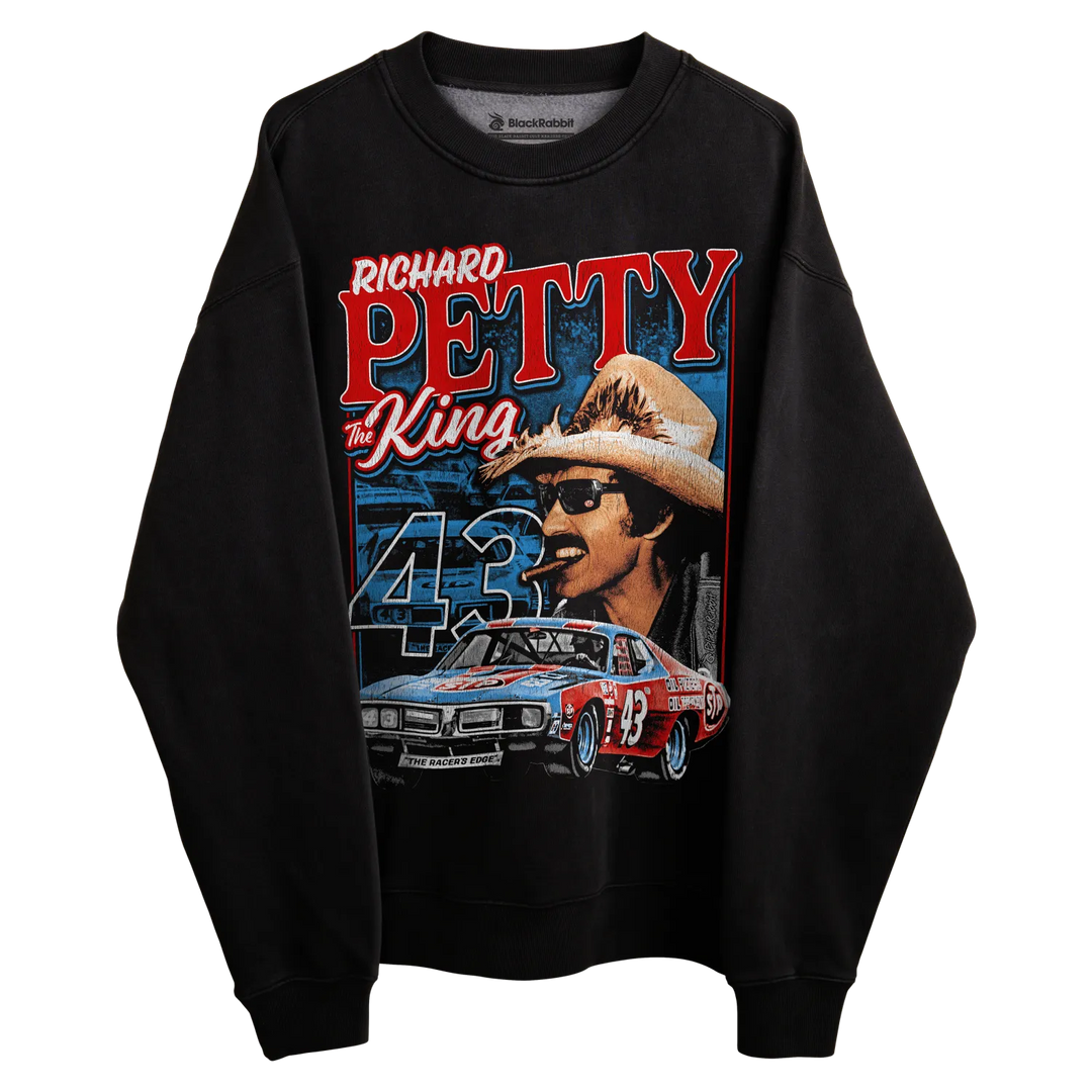 Black long-sleeved sweatshirt with richard petty design featuring a race car and the number 43, made of cotton.