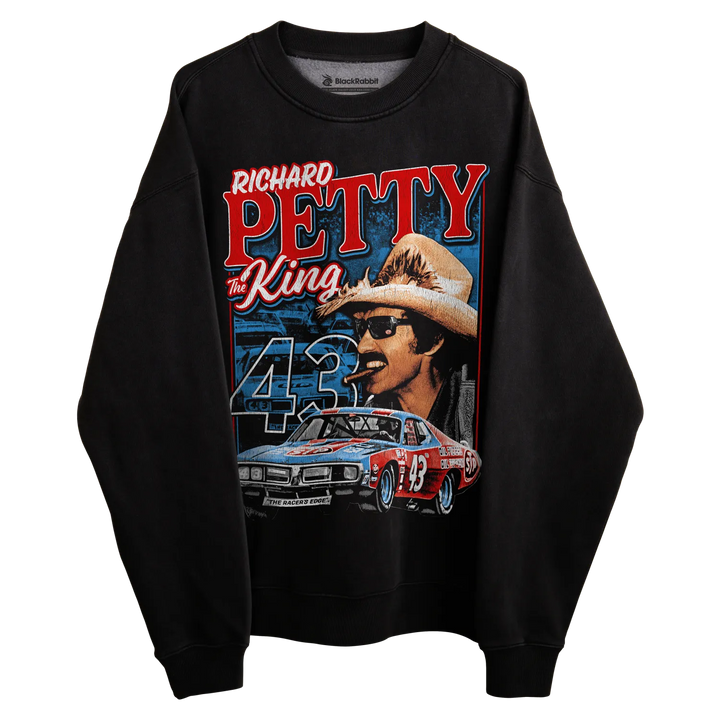 Black long-sleeved sweatshirt with richard petty design featuring a race car and the number 43, made of cotton.