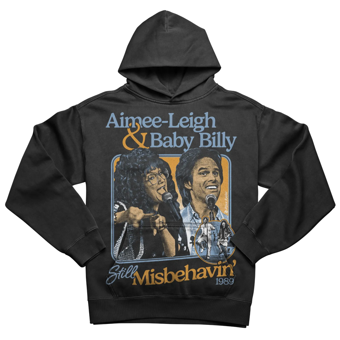 Black hooded sweatshirt with a graphic print of two singers and ’Still Misbehavin’ 1989’’.