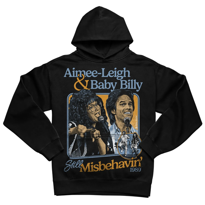 Black hoodie with graphic design of two performers and text ’aimee-leigh & baby billy still misbehavin’ 1983’’ in white.