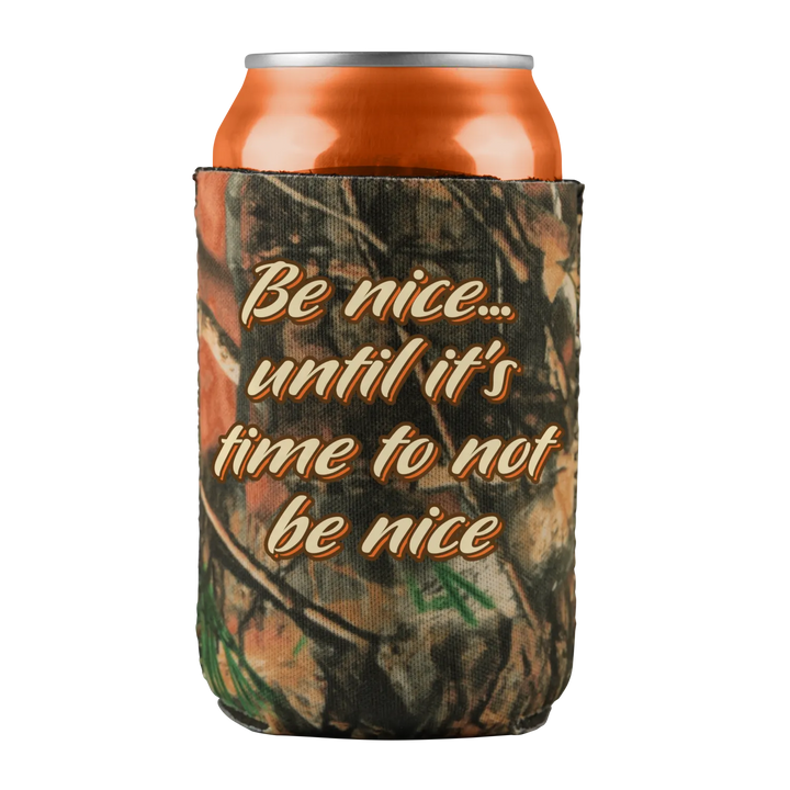 Orange beverage can in a camouflage koozie.