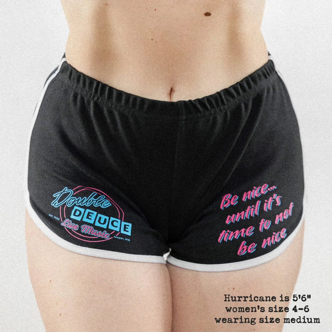 Front-view of Female model wearing the Black / White variant of Black Rabbit&