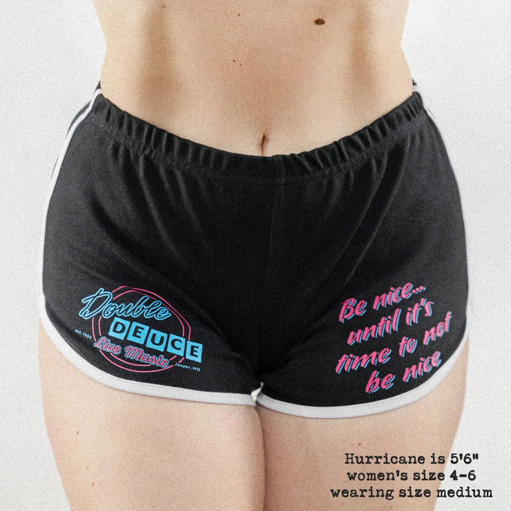 Front-view of Female model wearing the Black / White variant of Black Rabbit&