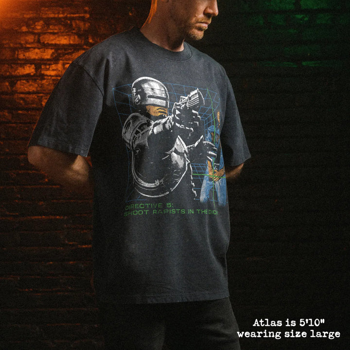 Male model wearing stone wash heavy tee with dick shot graphic 