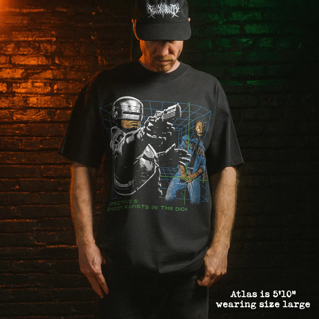 Model wearing heavy tee with robocop dick shot graphic 