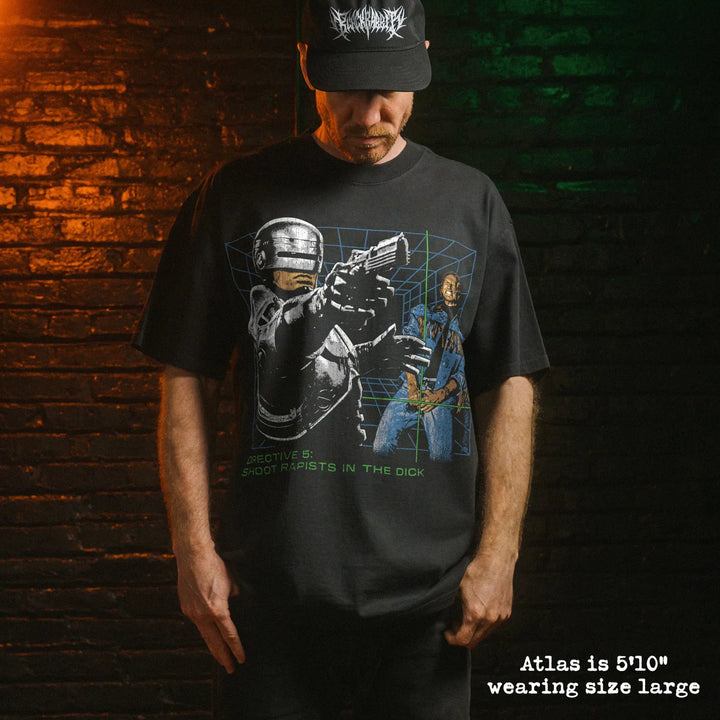 Model wearing heavy tee with robocop dick shot graphic 