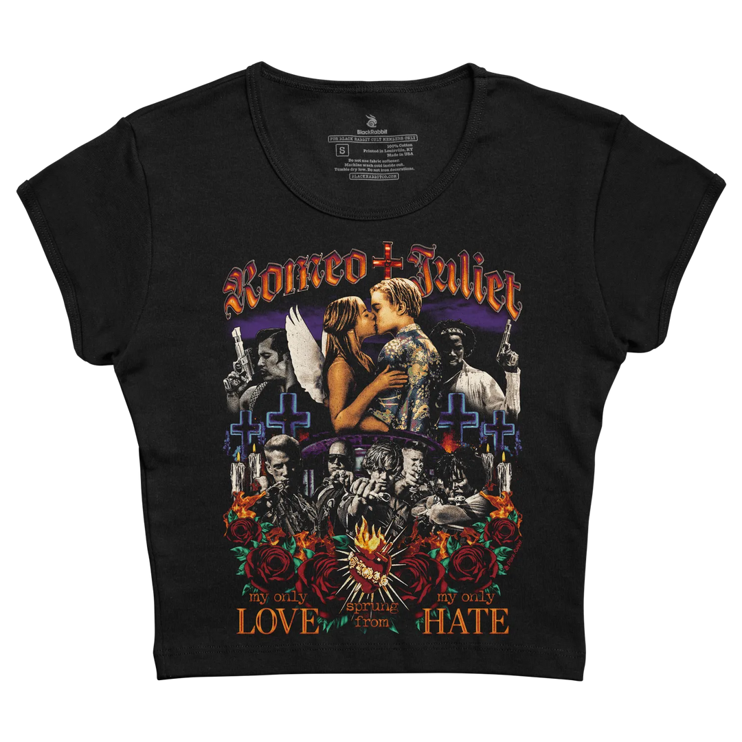 Black cropped t-shirt featuring a detailed graphic print of romeo and juliet with ornate lettering, crosses, roses, and the phrase ’my only love from hate’ beneath.