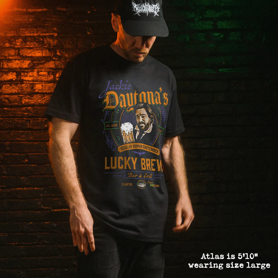 Male model wear soft premium tee with Jackie Daytona graphic

