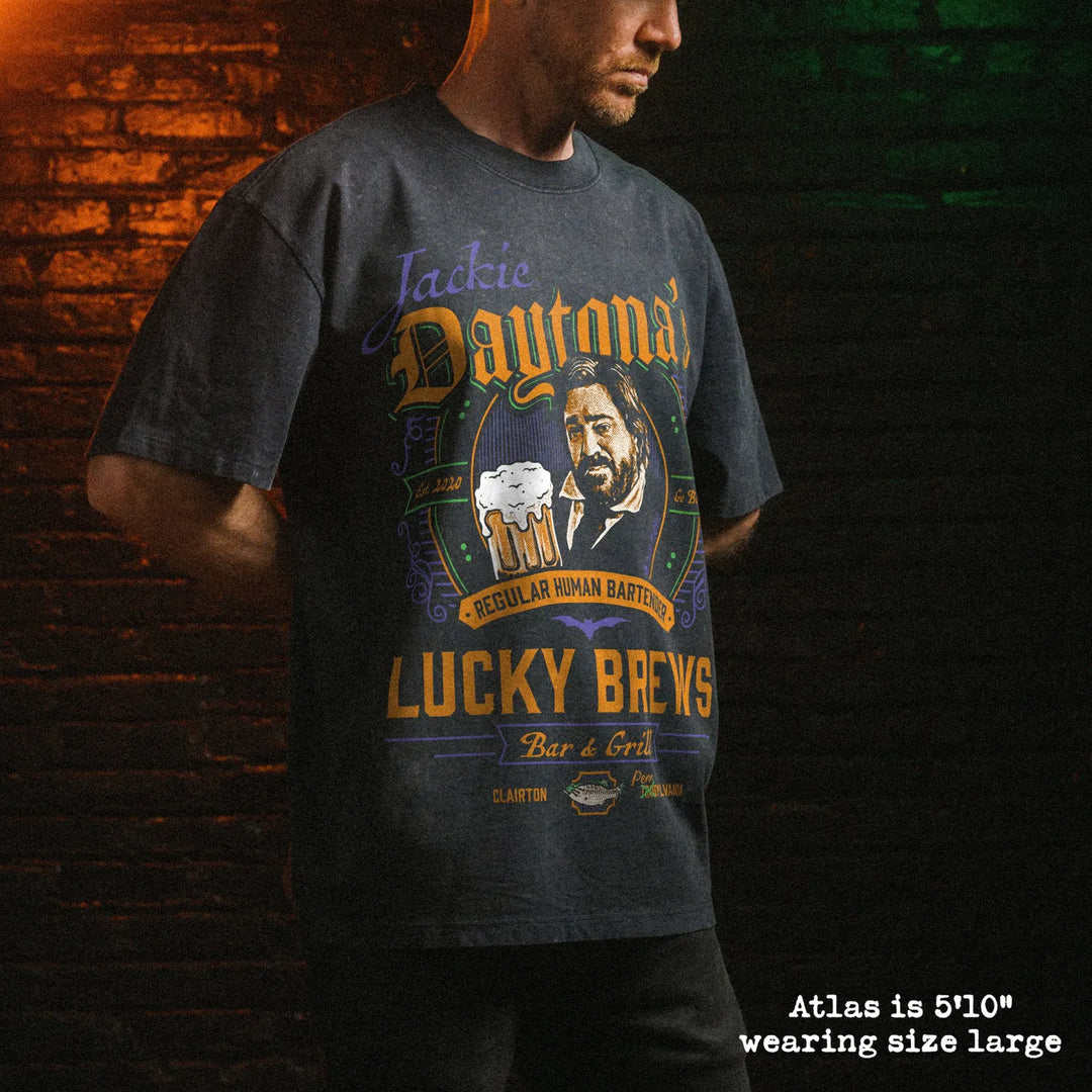 Male model wearing stone wash heavy tee with jackie daytona graphic 