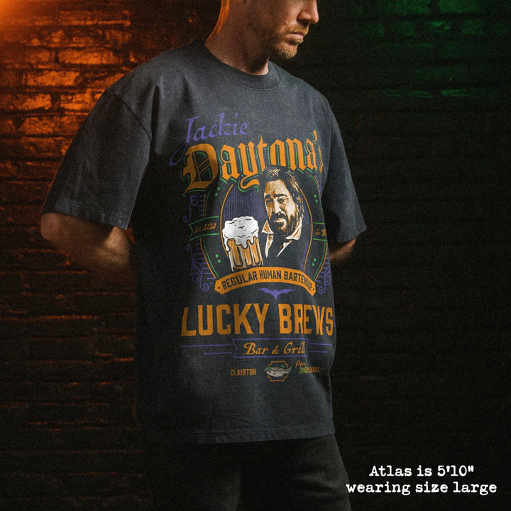 Male model wearing stone wash heavy tee with jackie daytona graphic 