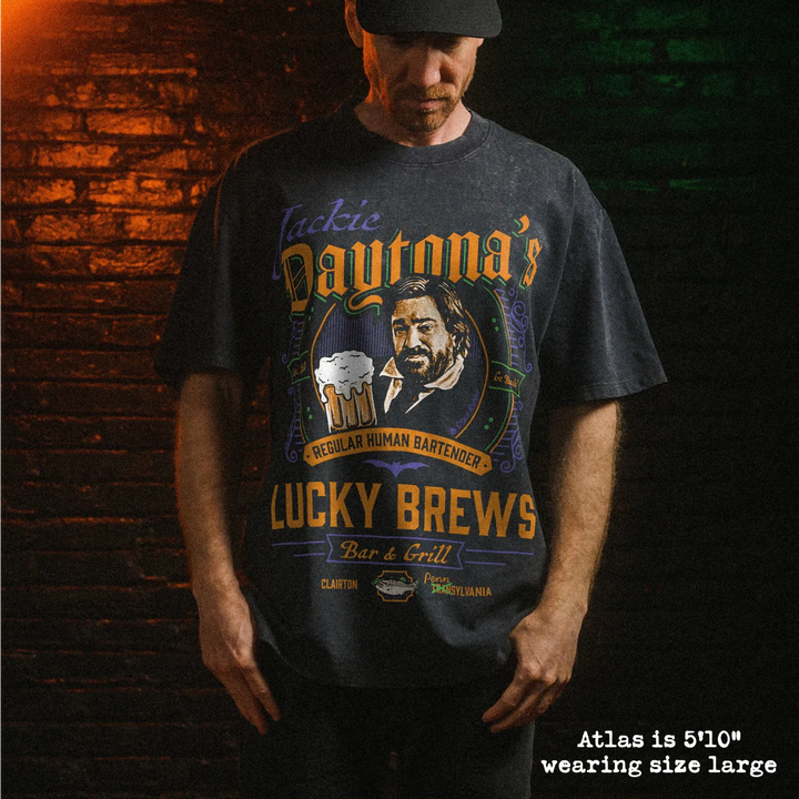 Male model wearing stone wash heavy tee with jackie daytona graphic 