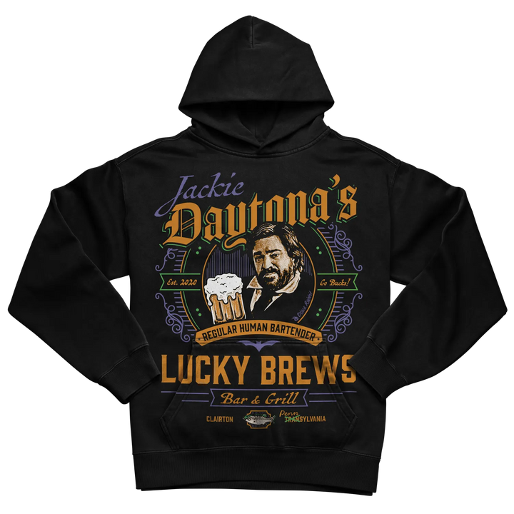 Black hoodie with ’jackie daytona’s lucky brews’ design featuring a smiling man and beer mug, made of cotton.