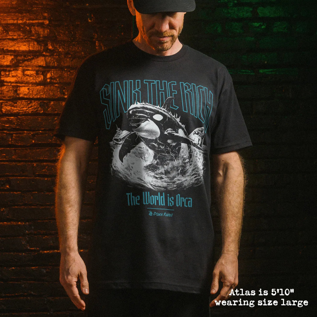 Male model wear soft premium tee with orca graphic
