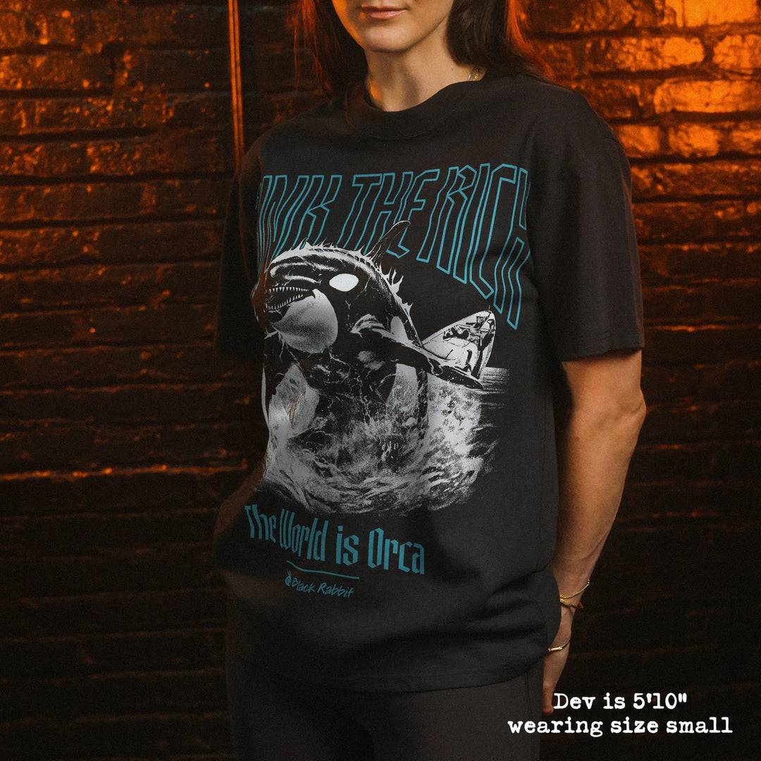 Model wearing heavy tee with orca graphic 