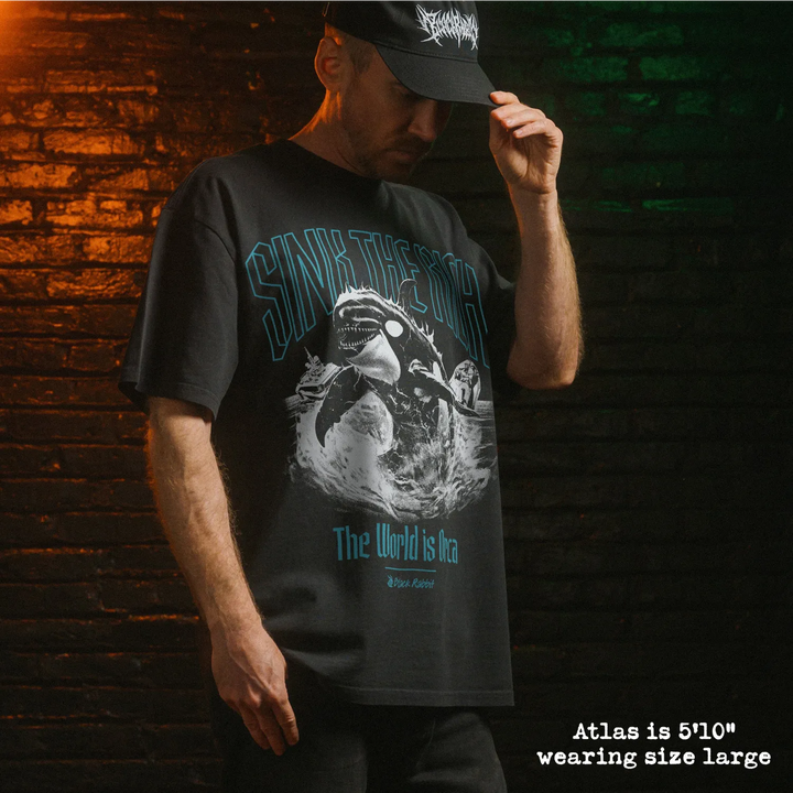 Model wearing heavy tee with orca graphic 