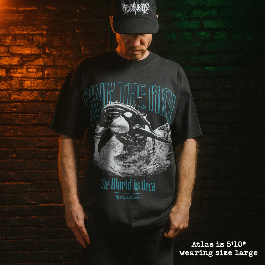 Model wearing heavy tee with orca graphic 