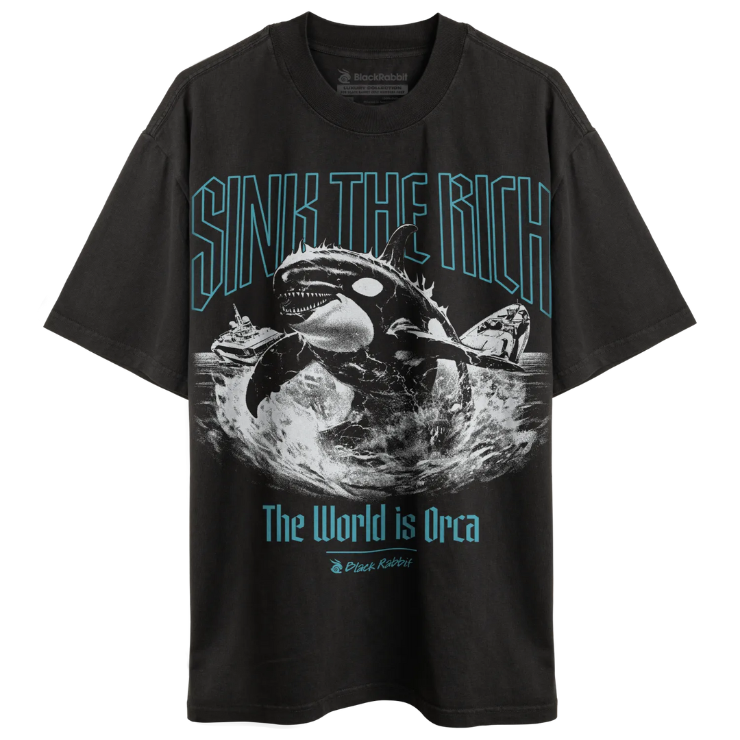 Black t-shirt with an orca attacking a ship design.