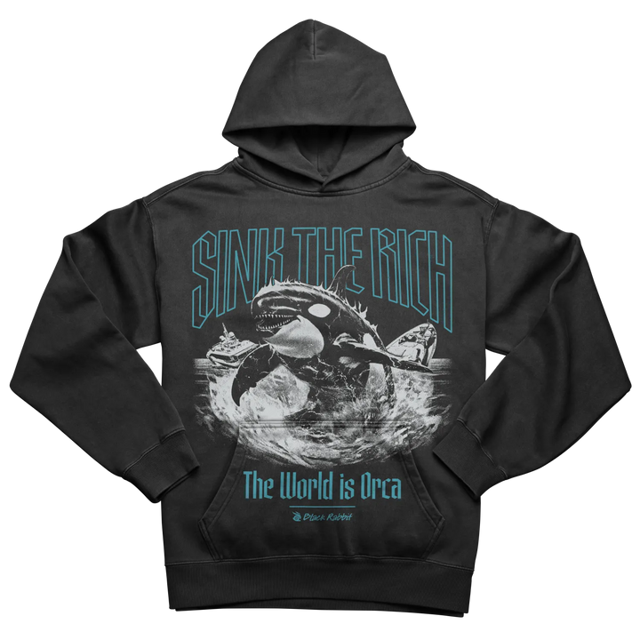 A black hooded sweatshirt with a graphic print of an orca and a sinking ship.