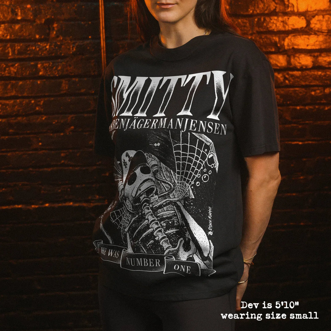 Model wearing heavy tee with smitty graphic 