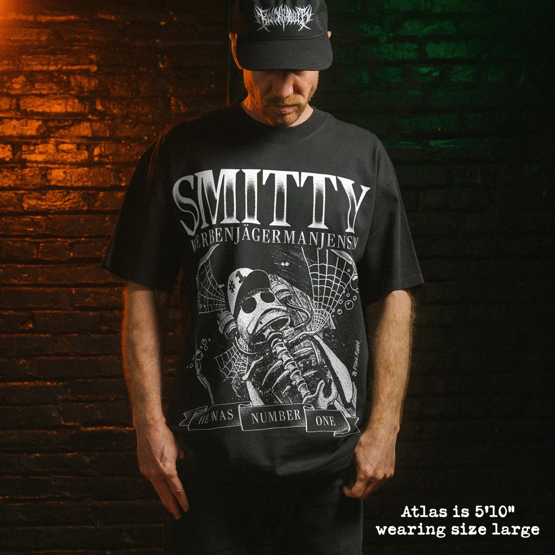Model wearing heavy tee with smitty graphic 